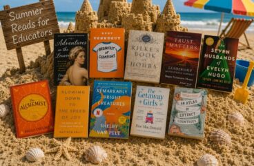 Pile of Summer Reads for Educators Books on Sand Castle